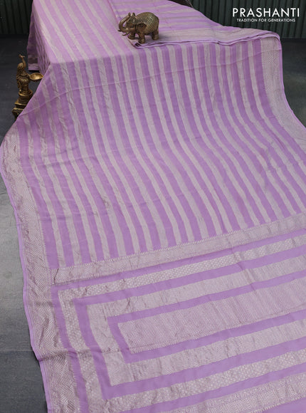 Banarasi georgette saree lavender shade with allover thread & zari weaves and woven border