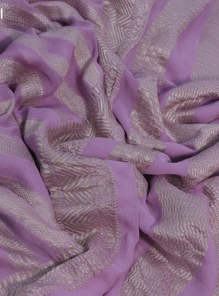 Banarasi georgette saree lavender shade with allover thread & zari weaves and woven border