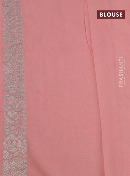 Banarasi georgette saree pastel peah orange with allover thread & zari weaves and woven border