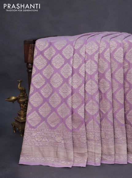 Banarasi georgette saree pastel lavender with allover thread & zari woven butta weaves and woven border