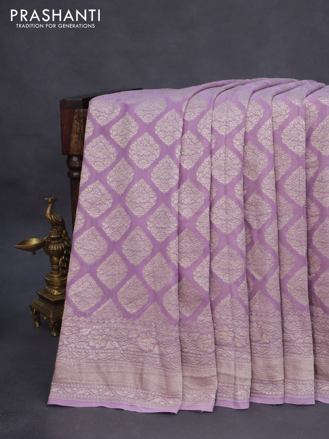 Banarasi georgette saree pastel lavender with allover thread & zari woven butta weaves and woven border