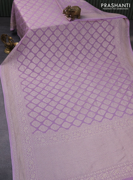 Banarasi georgette saree pastel lavender with allover thread & zari woven butta weaves and woven border