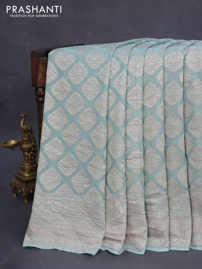 Banarasi georgette saree pastel blue shade with allover thread & zari woven butta weaves and woven border