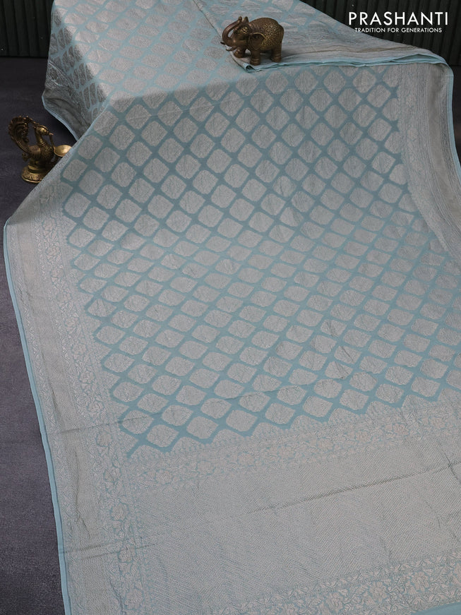 Banarasi georgette saree pastel blue shade with allover thread & zari woven butta weaves and woven border