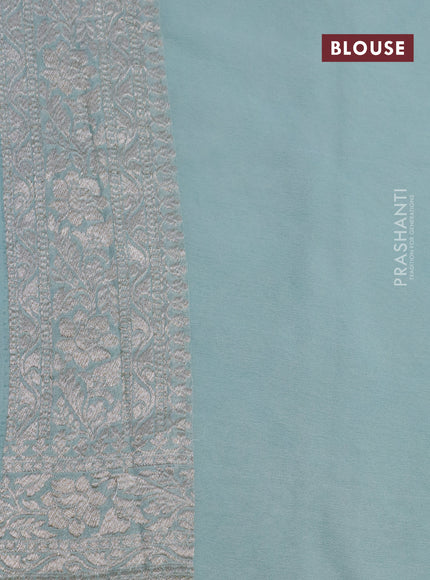 Banarasi georgette saree pastel blue shade with allover thread & zari woven butta weaves and woven border