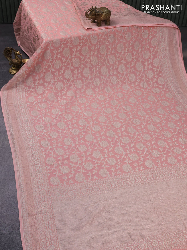 Banarasi georgette saree pastel peach with allover thread & zari weaves and woven border