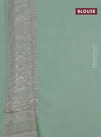 Banarasi georgette saree pastel green shade with allover thread & zari weaves and woven border