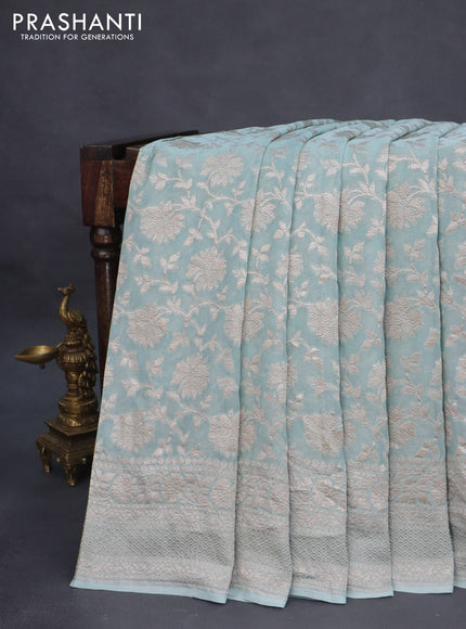 Banarasi georgette saree pastel blue shade with allover thread & zari weaves and woven border