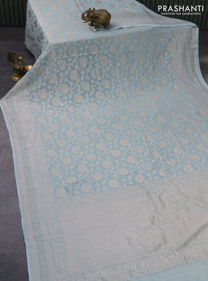 Banarasi georgette saree pastel blue shade with allover thread & zari weaves and woven border