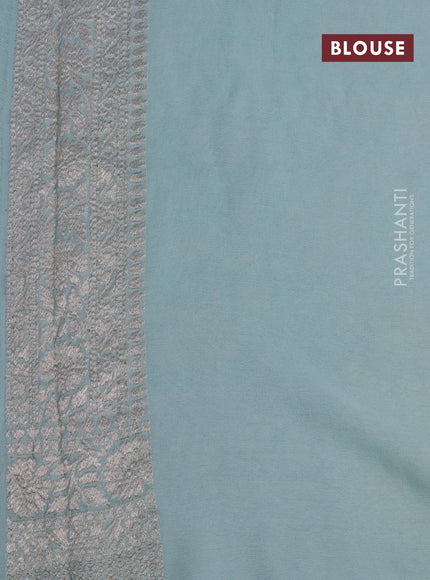 Banarasi georgette saree pastel blue shade with allover thread & zari weaves and woven border