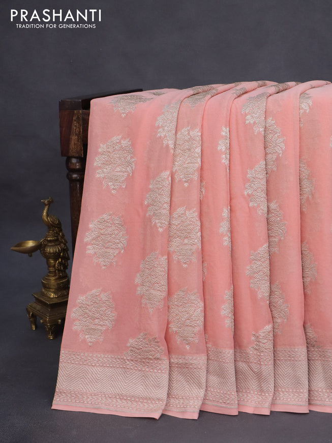 Banarasi georgette saree peach shade with allover thread & zari woven butta wevaes and woven border