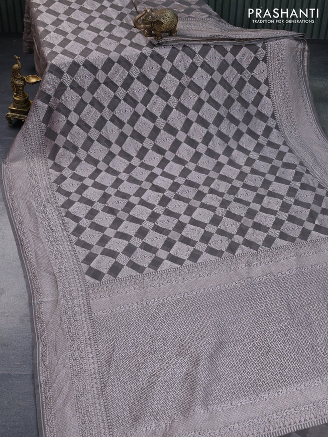 Banarasi georgette saree grey shade with allover thread & zari woven geometric weaves and woven border