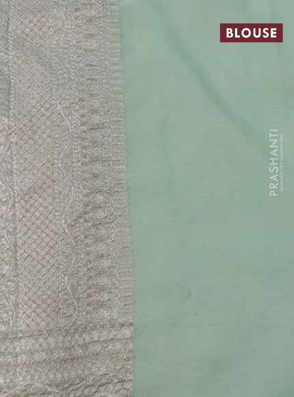 Banarasi georgette saree pastel green with allover thread & zari woven geometric weaves and woven border