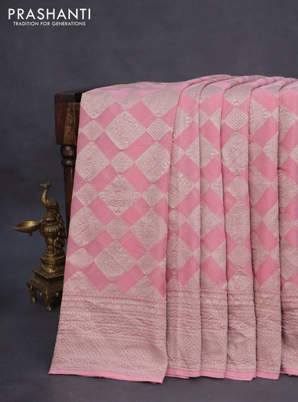 Banarasi georgette saree pastel pink with allover thread & zari woven geometric weaves and woven border