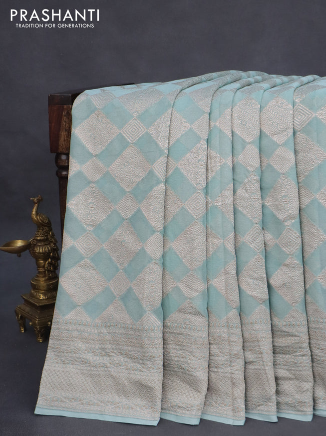 Banarasi georgette saree pastel blue with allover thread & zari woven geometric weaves and woven border