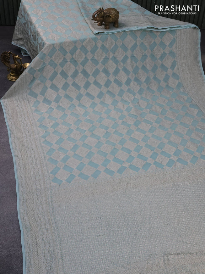 Banarasi georgette saree pastel blue with allover thread & zari woven geometric weaves and woven border