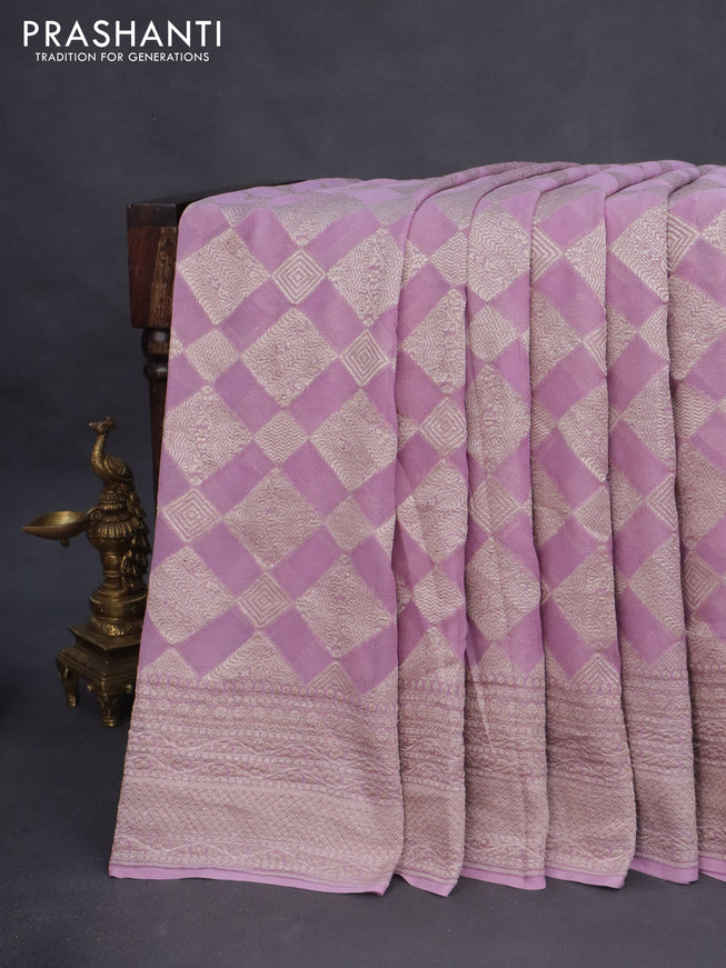 Banarasi georgette saree lavender shade with allover thread & zari woven geometric weaves and woven border