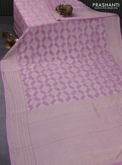 Banarasi georgette saree lavender shade with allover thread & zari woven geometric weaves and woven border