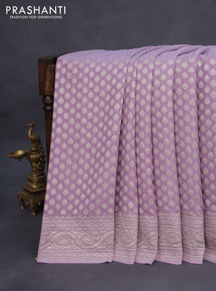 Banarasi georgette saree lavender shade with allover thread & zari woven butta wevaes and woven border