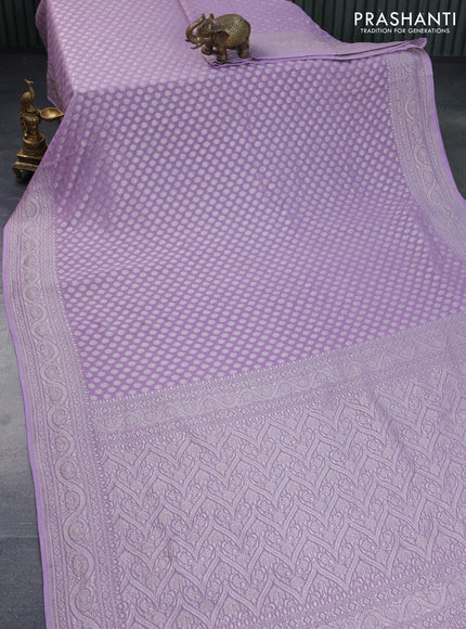 Banarasi georgette saree lavender shade with allover thread & zari woven butta wevaes and woven border