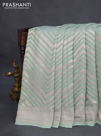 Banarasi georgette saree pastel green with allover thread & zari woven zig zag weaves and woven border