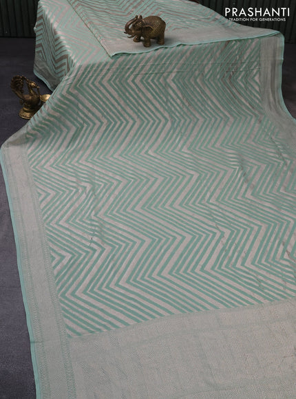 Banarasi georgette saree pastel green with allover thread & zari woven zig zag weaves and woven border