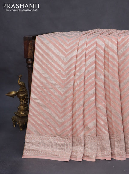 Banarasi georgette saree peach shade with allover thread & zari woven zig zag weaves and woven border