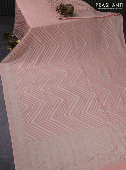 Banarasi georgette saree peach shade with allover thread & zari woven zig zag weaves and woven border