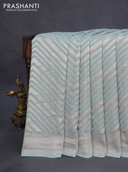 Banarasi georgette saree pastel blue with allover thread & zari woven zig zag weaves and woven border