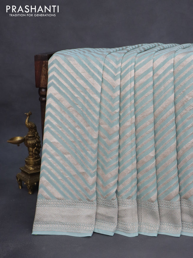 Banarasi georgette saree pastel blue with allover thread & zari woven zig zag weaves and woven border