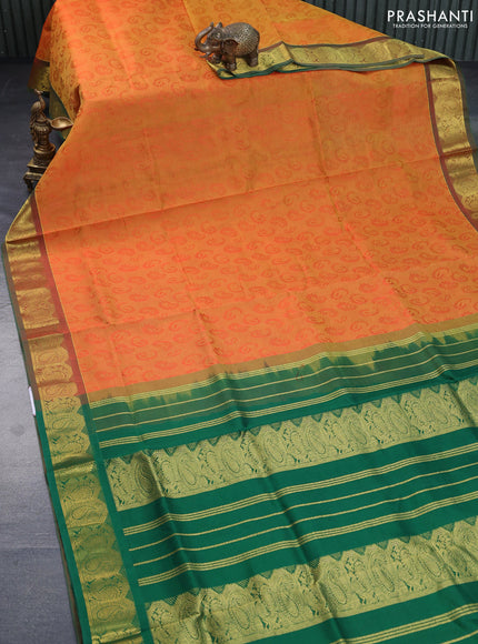 Silk cotton saree dual shade of orange and green with allover self emboss & jacquard and paisley & annam zari woven border