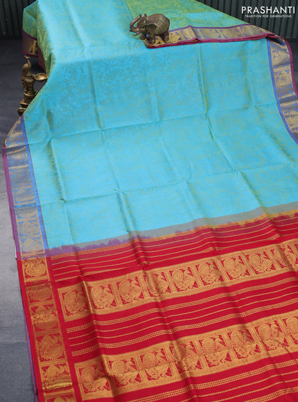 Silk cotton saree dual shade of teal bluish green and red with allover self emboss & jacquard and annam zari woven border