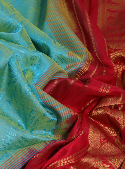 Silk cotton saree dual shade of teal bluish green and red with allover self emboss & jacquard and annam zari woven border