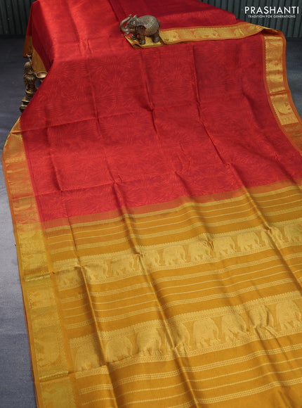 Silk cotton saree rustic orange and dark mustard with allover self emboss & jacquard and elephant zari woven border