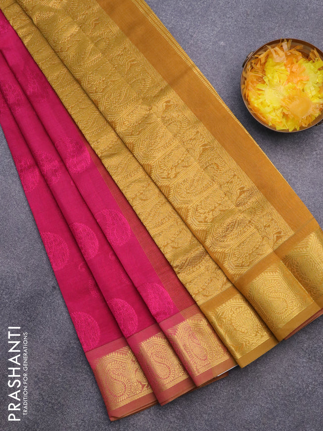 Silk cotton saree pink and dark mustard with allover self emboss & jacquard and paisley zari woven border