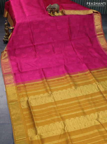 Silk cotton saree pink and dark mustard with allover self emboss & jacquard and paisley zari woven border