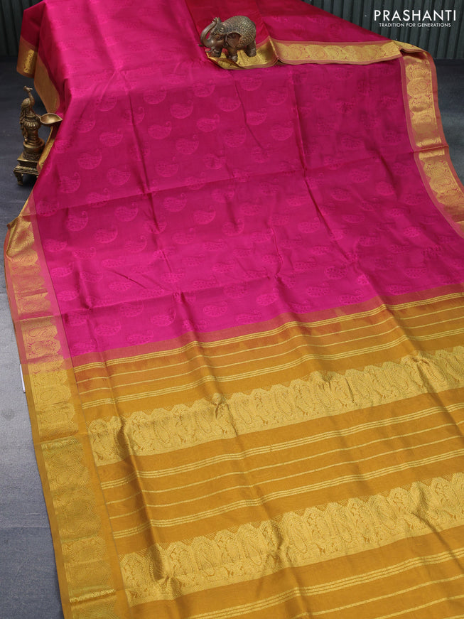 Silk cotton saree pink and dark mustard with allover self emboss & jacquard and paisley zari woven border