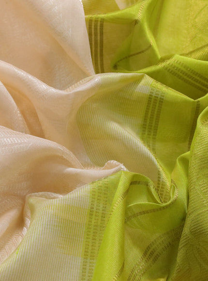 Silk cotton saree cream and light green with allover self emboss & jacquard and rich zari woven border