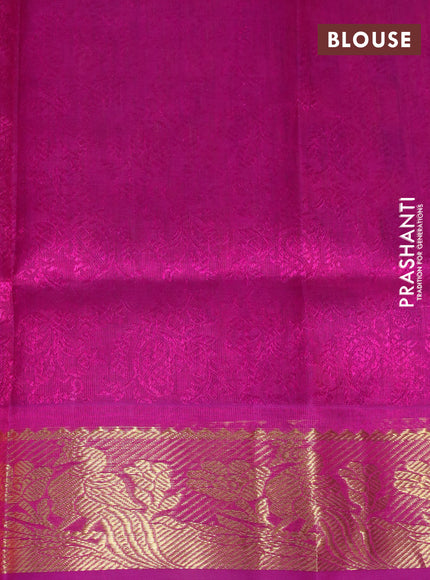 Silk cotton saree dual shade of orange and purple with allover self emboss & jacquard and peacock zari woven border