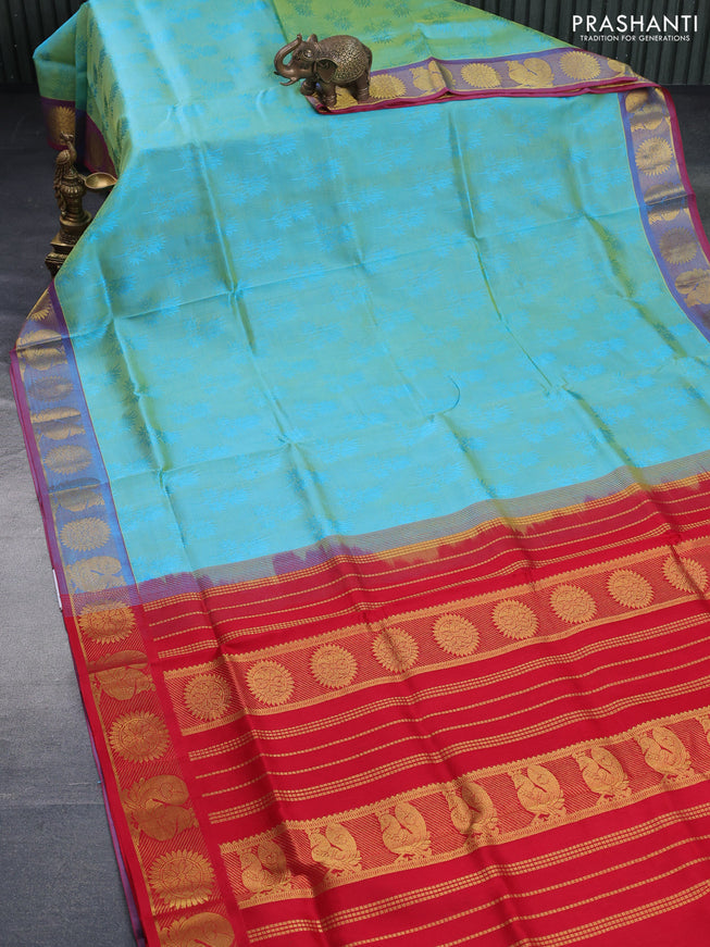 Silk cotton saree dual shade of teal bluish green and red with allover self emboss & jacquard and rudhraksha & annam zari woven border