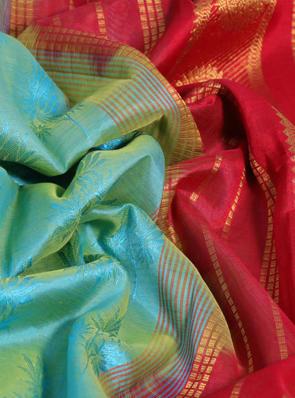 Silk cotton saree dual shade of teal bluish green and red with allover self emboss & jacquard and rudhraksha & annam zari woven border