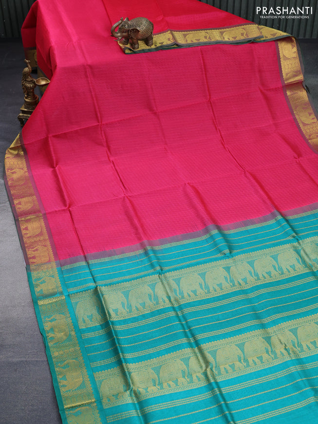 Silk cotton saree pink and teal green with allover self emboss & jacquard and elephant zari woven border