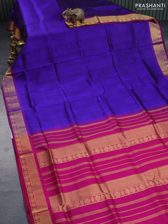 Silk cotton saree blue and magenta pink with allover self emboss & jacquard and zari woven border