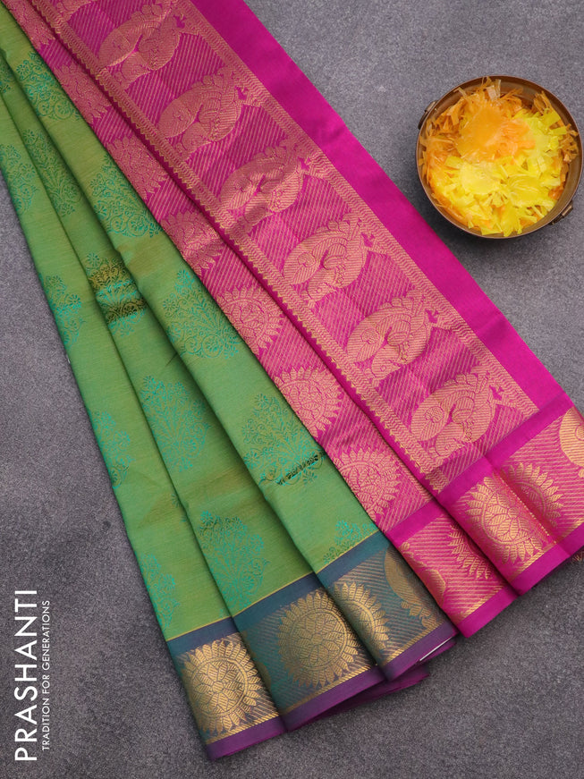 Silk cotton saree dual shade of green and magenta pink with allover self emboss & jacquard and rudhraksha & annam zari woven border