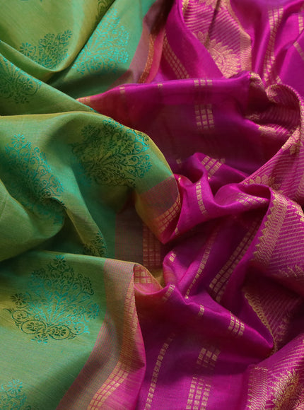 Silk cotton saree dual shade of green and magenta pink with allover self emboss & jacquard and rudhraksha & annam zari woven border