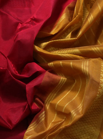 Silk cotton saree maroon and mustard yellow with allover self emboss & jacquard and zari woven border