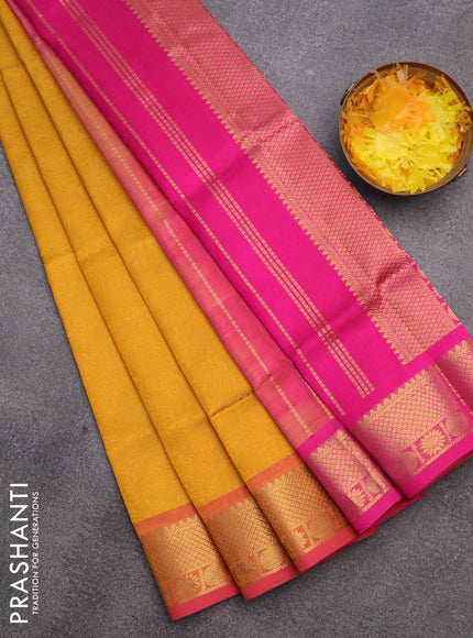 Silk cotton saree yellow and pink with allover self emboss & jacquard and zari woven border