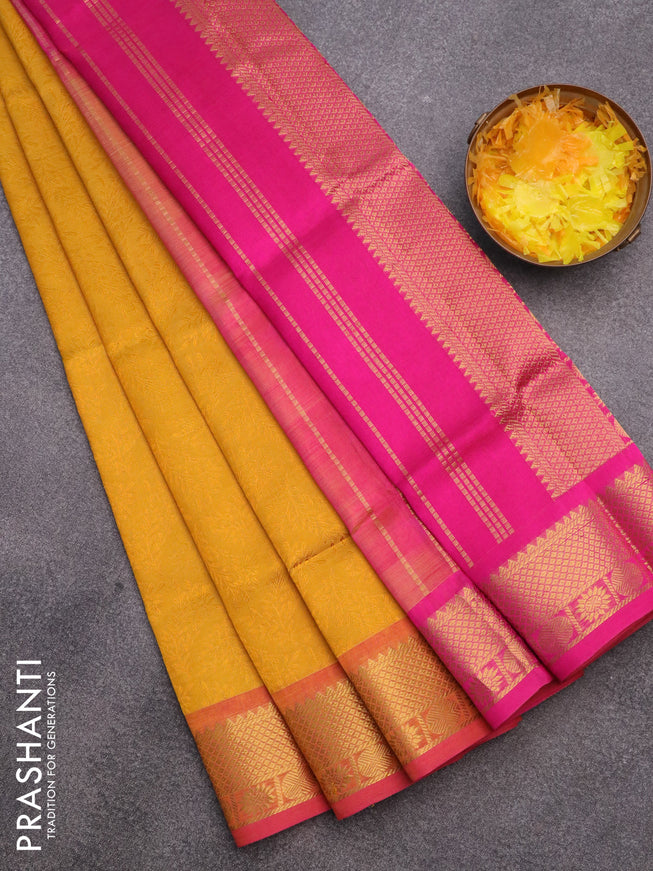 Silk cotton saree yellow and pink with allover self emboss & jacquard and zari woven border