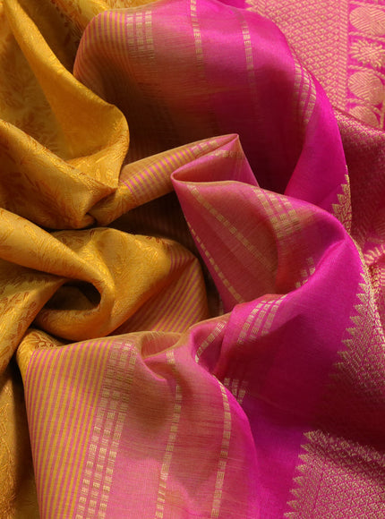 Silk cotton saree yellow and pink with allover self emboss & jacquard and zari woven border