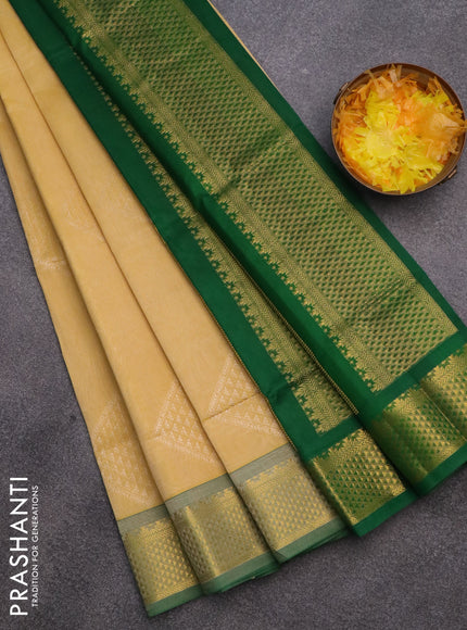 Silk cotton saree yellow and green with allover self emboss & jacquard and zari woven border